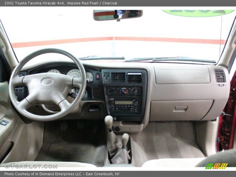Impulse Red Pearl / Charcoal 2002 Toyota Tacoma Xtracab 4x4