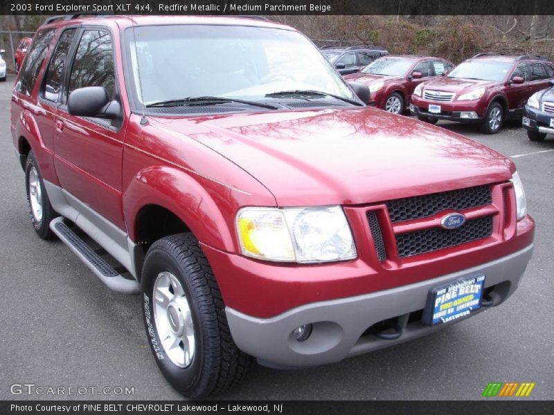 Redfire Metallic / Medium Parchment Beige 2003 Ford Explorer Sport XLT 4x4