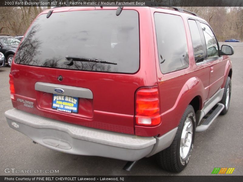 Redfire Metallic / Medium Parchment Beige 2003 Ford Explorer Sport XLT 4x4