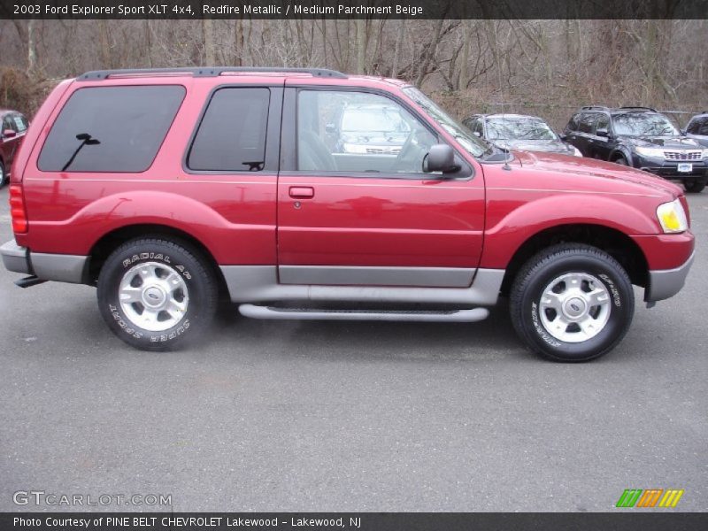 Redfire Metallic / Medium Parchment Beige 2003 Ford Explorer Sport XLT 4x4
