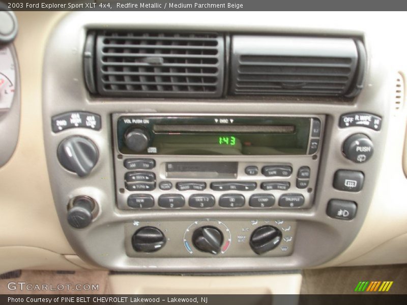 Redfire Metallic / Medium Parchment Beige 2003 Ford Explorer Sport XLT 4x4