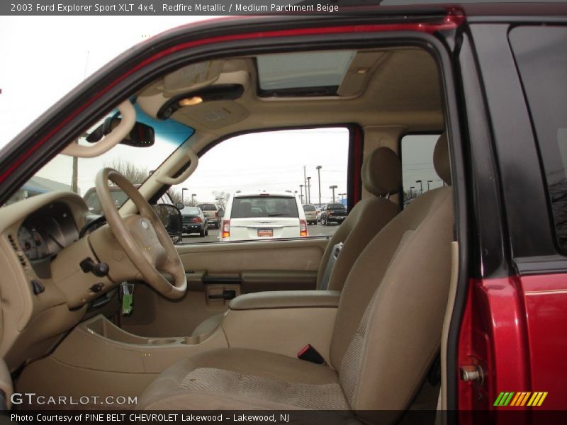 Redfire Metallic / Medium Parchment Beige 2003 Ford Explorer Sport XLT 4x4