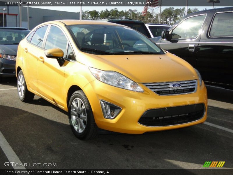 Yellow Blaze Metallic Tri-Coat / Charcoal Black/Blue Cloth 2011 Ford Fiesta SEL Sedan