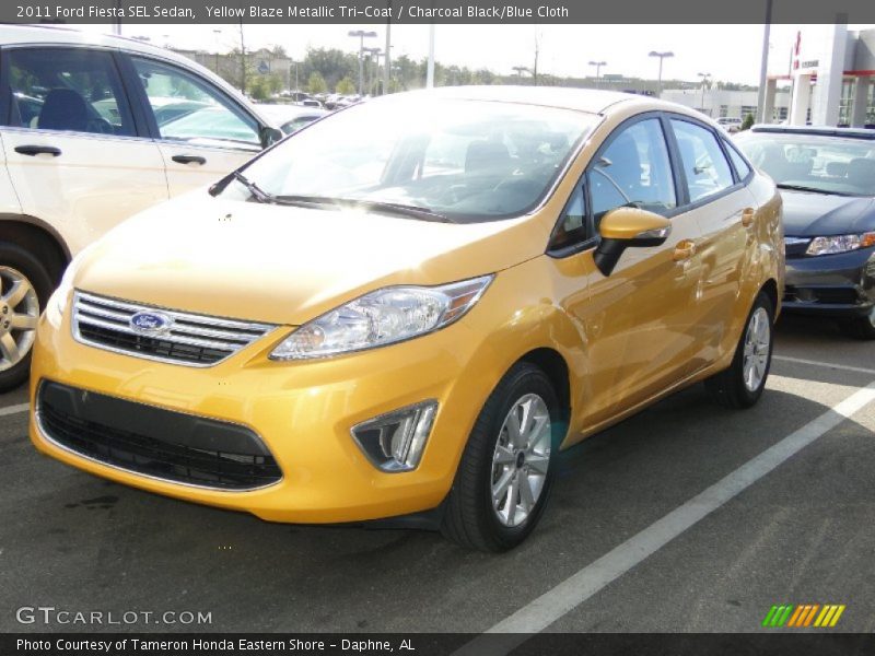 Yellow Blaze Metallic Tri-Coat / Charcoal Black/Blue Cloth 2011 Ford Fiesta SEL Sedan