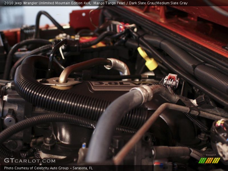 Mango Tango Pearl / Dark Slate Gray/Medium Slate Gray 2010 Jeep Wrangler Unlimited Mountain Edition 4x4