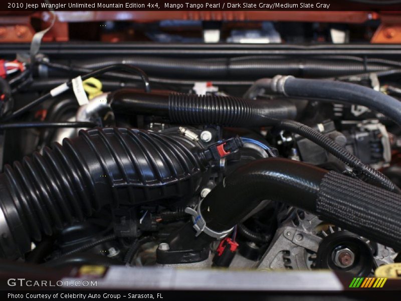 Mango Tango Pearl / Dark Slate Gray/Medium Slate Gray 2010 Jeep Wrangler Unlimited Mountain Edition 4x4
