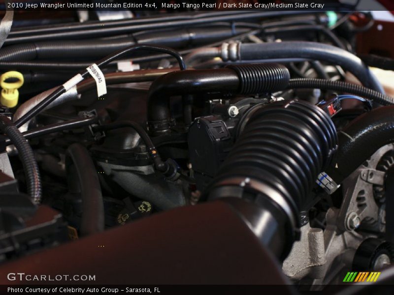 Mango Tango Pearl / Dark Slate Gray/Medium Slate Gray 2010 Jeep Wrangler Unlimited Mountain Edition 4x4