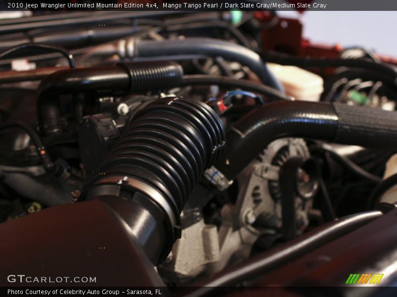 Mango Tango Pearl / Dark Slate Gray/Medium Slate Gray 2010 Jeep Wrangler Unlimited Mountain Edition 4x4