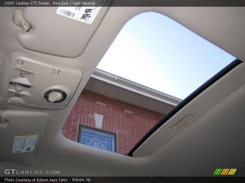 Red Line / Light Neutral 2005 Cadillac CTS Sedan