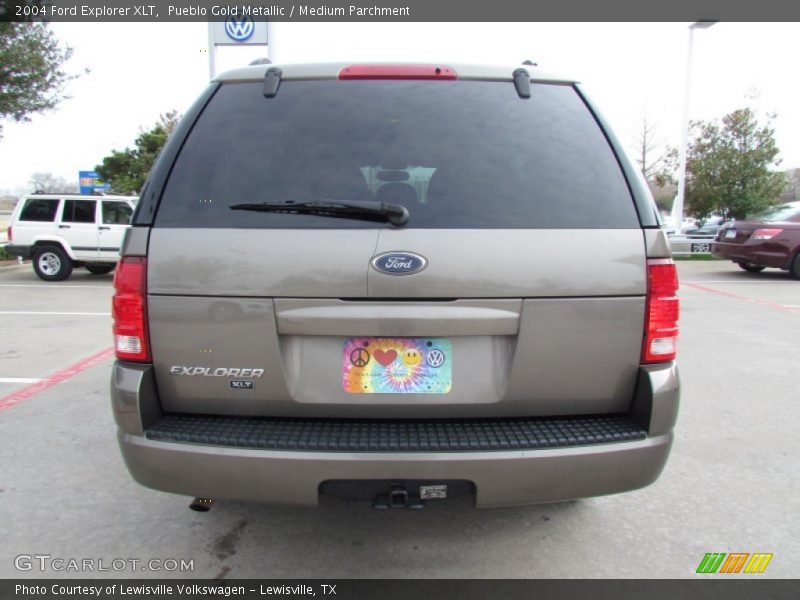 Pueblo Gold Metallic / Medium Parchment 2004 Ford Explorer XLT