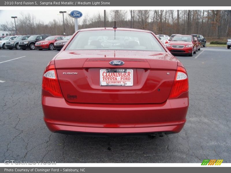 Sangria Red Metallic / Medium Light Stone 2010 Ford Fusion S