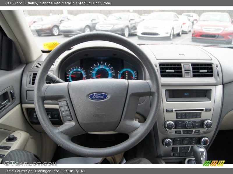 Sangria Red Metallic / Medium Light Stone 2010 Ford Fusion S