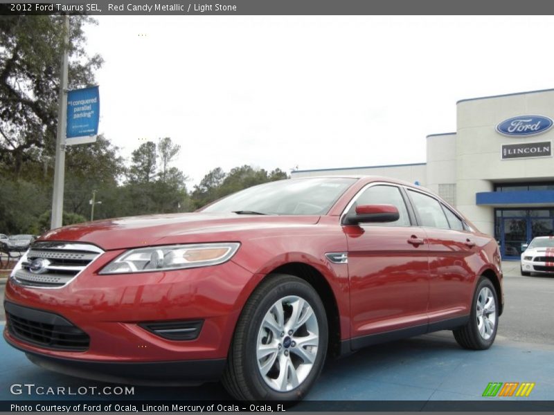 Red Candy Metallic / Light Stone 2012 Ford Taurus SEL