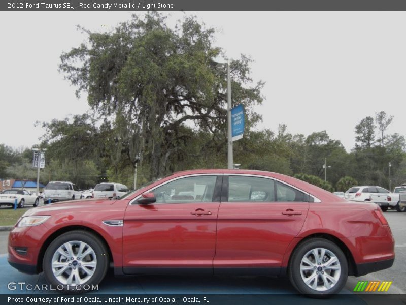 Red Candy Metallic / Light Stone 2012 Ford Taurus SEL