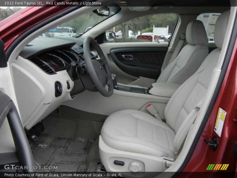 Red Candy Metallic / Light Stone 2012 Ford Taurus SEL
