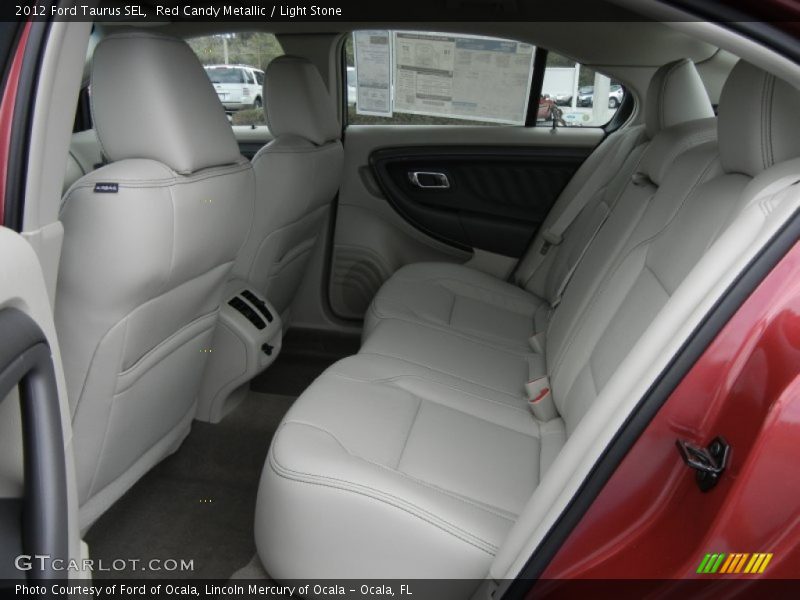 Red Candy Metallic / Light Stone 2012 Ford Taurus SEL