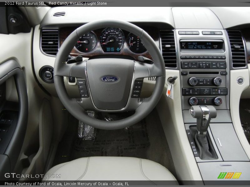 Red Candy Metallic / Light Stone 2012 Ford Taurus SEL