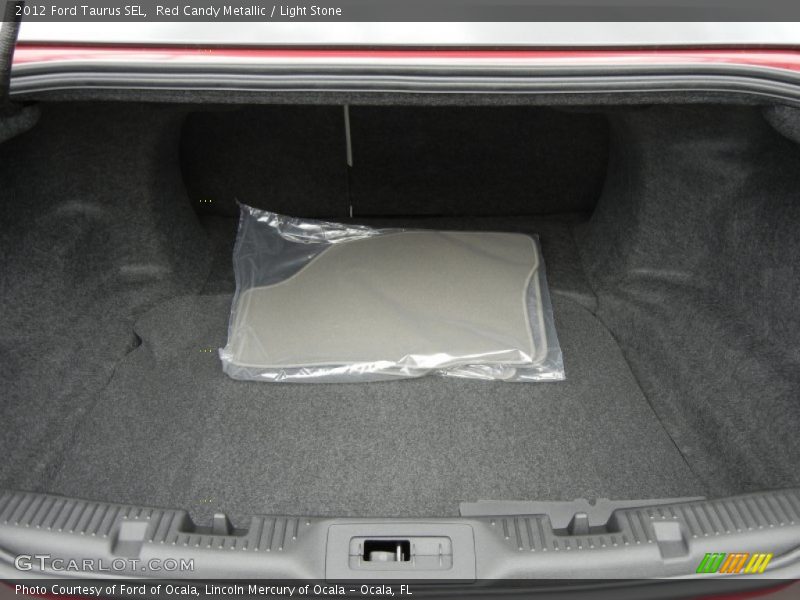 Red Candy Metallic / Light Stone 2012 Ford Taurus SEL