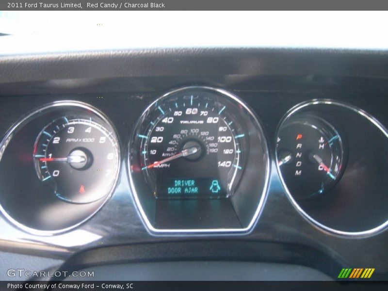 Red Candy / Charcoal Black 2011 Ford Taurus Limited