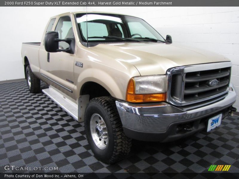 Harvest Gold Metallic / Medium Parchment 2000 Ford F250 Super Duty XLT Extended Cab 4x4