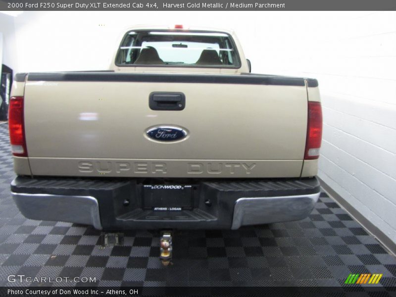 Harvest Gold Metallic / Medium Parchment 2000 Ford F250 Super Duty XLT Extended Cab 4x4