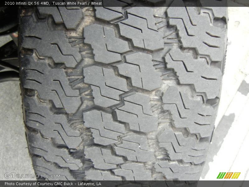 Tuscan White Pearl / Wheat 2010 Infiniti QX 56 4WD