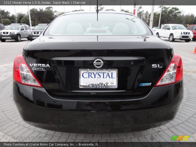 Super Black / Charcoal 2012 Nissan Versa 1.6 SL Sedan