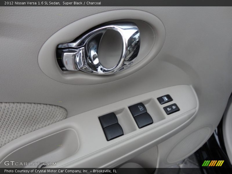 Super Black / Charcoal 2012 Nissan Versa 1.6 SL Sedan