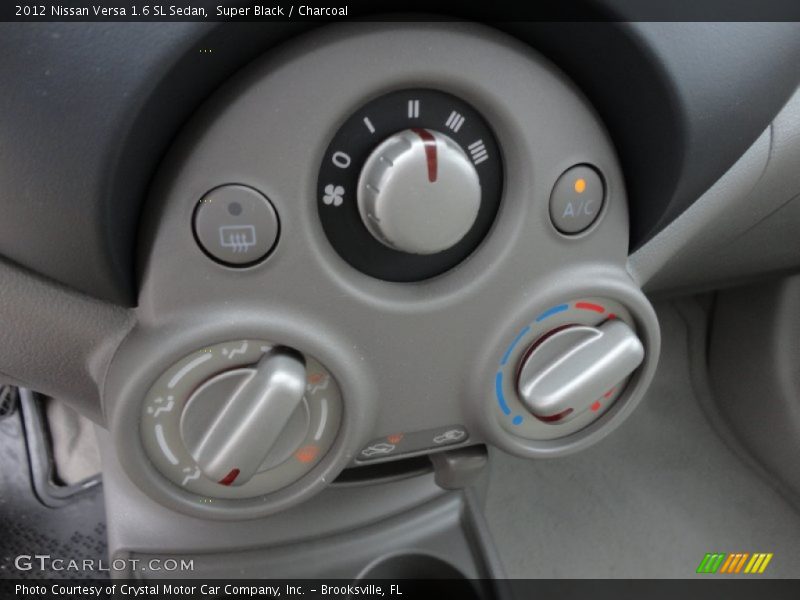 Super Black / Charcoal 2012 Nissan Versa 1.6 SL Sedan