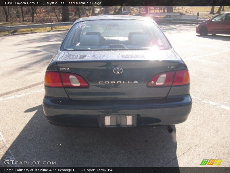 Mystic Teal Pearl Metallic / Beige 1998 Toyota Corolla LE
