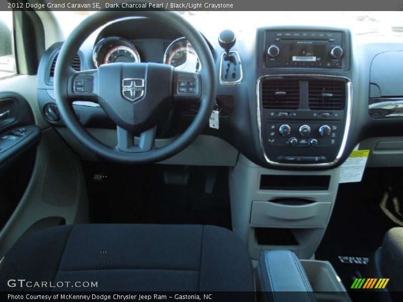 Dark Charcoal Pearl / Black/Light Graystone 2012 Dodge Grand Caravan SE