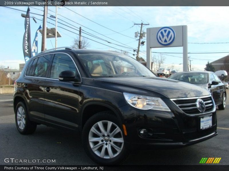 Deep Black Metallic / Sandstone 2009 Volkswagen Tiguan SE