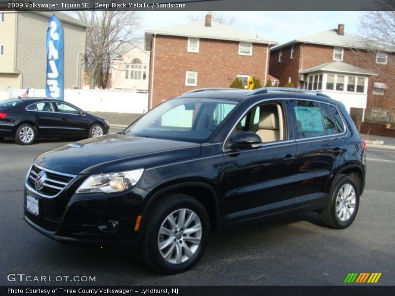 Deep Black Metallic / Sandstone 2009 Volkswagen Tiguan SE