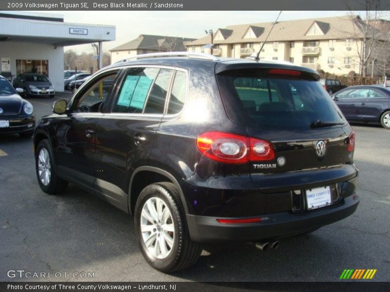 Deep Black Metallic / Sandstone 2009 Volkswagen Tiguan SE