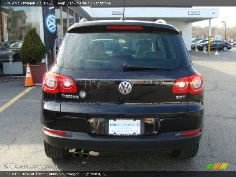 Deep Black Metallic / Sandstone 2009 Volkswagen Tiguan SE