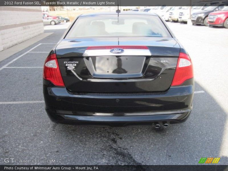 Tuxedo Black Metallic / Medium Light Stone 2012 Ford Fusion SEL