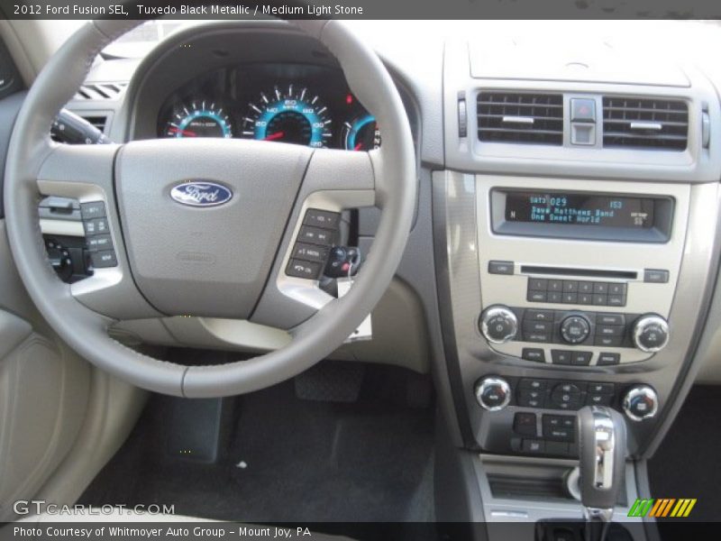 Tuxedo Black Metallic / Medium Light Stone 2012 Ford Fusion SEL