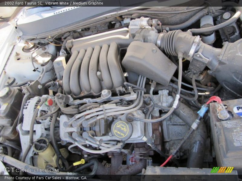 Vibrant White / Medium Graphite 2002 Ford Taurus SE