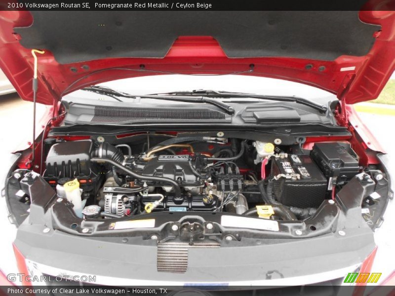 Pomegranate Red Metallic / Ceylon Beige 2010 Volkswagen Routan SE