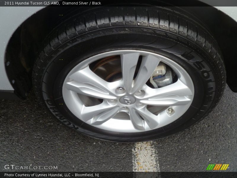 Diamond Silver / Black 2011 Hyundai Tucson GLS AWD