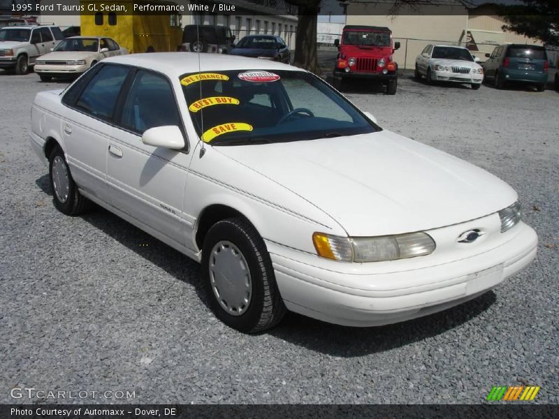 Performance White / Blue 1995 Ford Taurus GL Sedan
