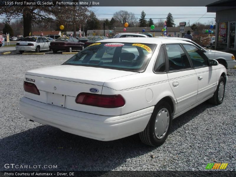 Performance White / Blue 1995 Ford Taurus GL Sedan