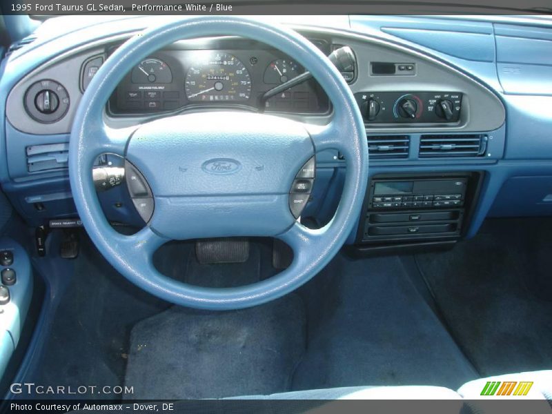 Performance White / Blue 1995 Ford Taurus GL Sedan