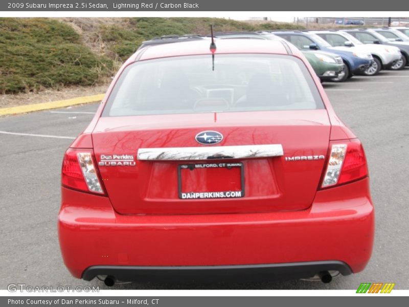 Lightning Red / Carbon Black 2009 Subaru Impreza 2.5i Sedan