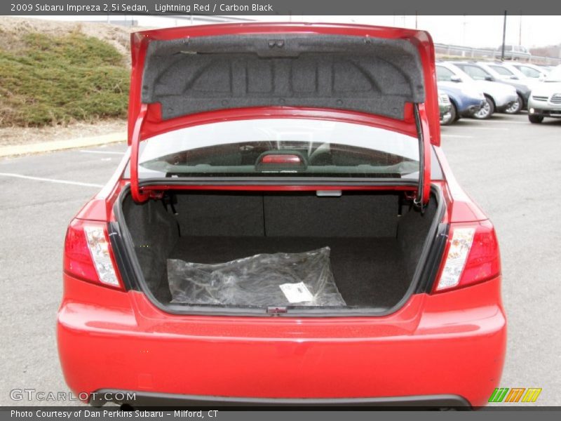 Lightning Red / Carbon Black 2009 Subaru Impreza 2.5i Sedan