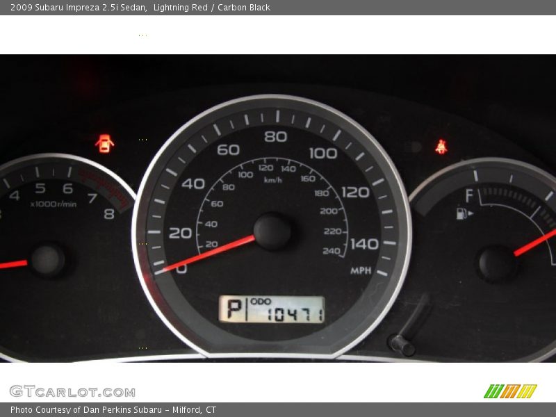 Lightning Red / Carbon Black 2009 Subaru Impreza 2.5i Sedan