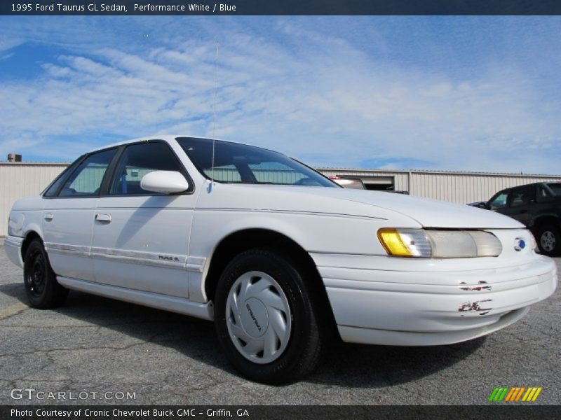 Performance White / Blue 1995 Ford Taurus GL Sedan