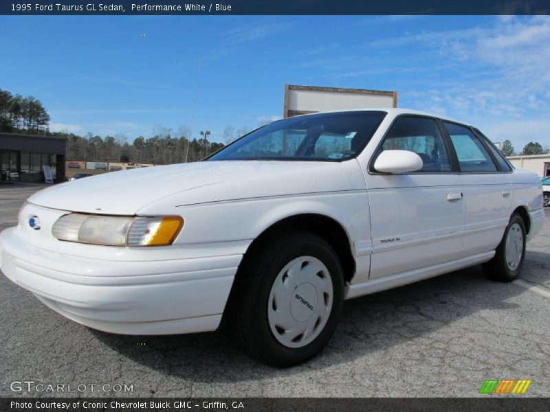 Performance White / Blue 1995 Ford Taurus GL Sedan