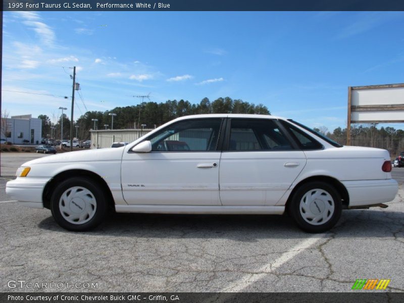 Performance White / Blue 1995 Ford Taurus GL Sedan