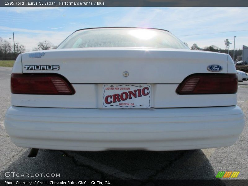 Performance White / Blue 1995 Ford Taurus GL Sedan